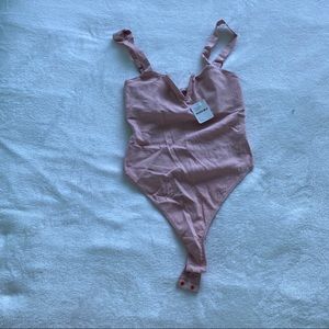 Light pink free people bodysuit tank